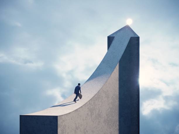 businessman walking on arrow-shaped bridge towards the light - success stock photos and images
