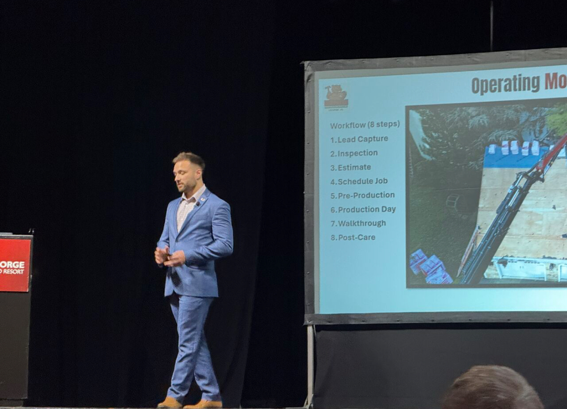 Sam Kensinger giving presentation to esteemed military and civilian leaders